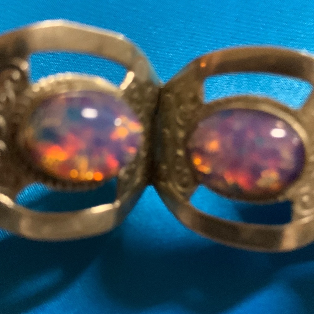 Bracelet has opals in it believe they are real.were sold as real. From Mexico